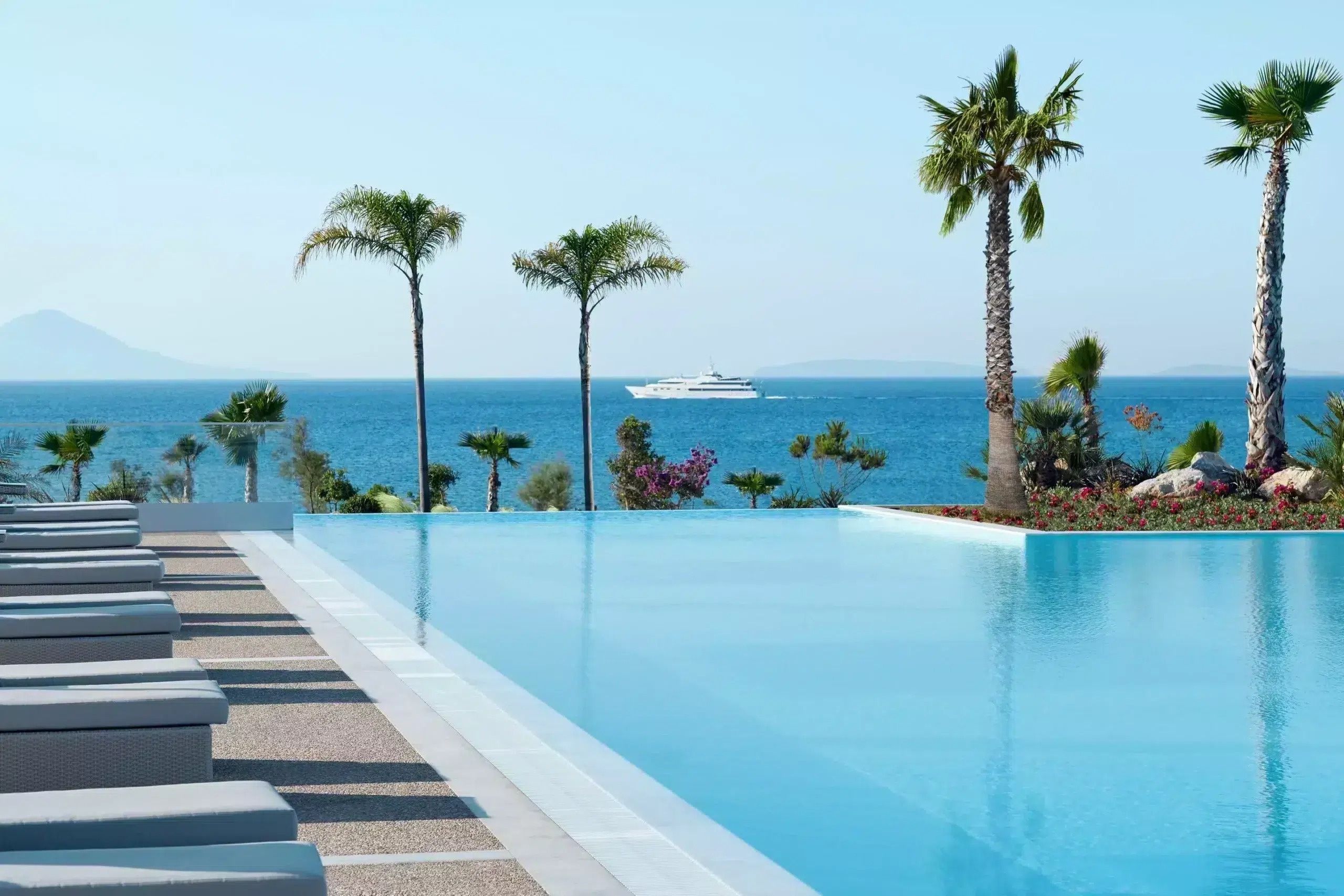 ikos-aria-griechenland-familienluxusreise-thefamilyproject-pool-meer