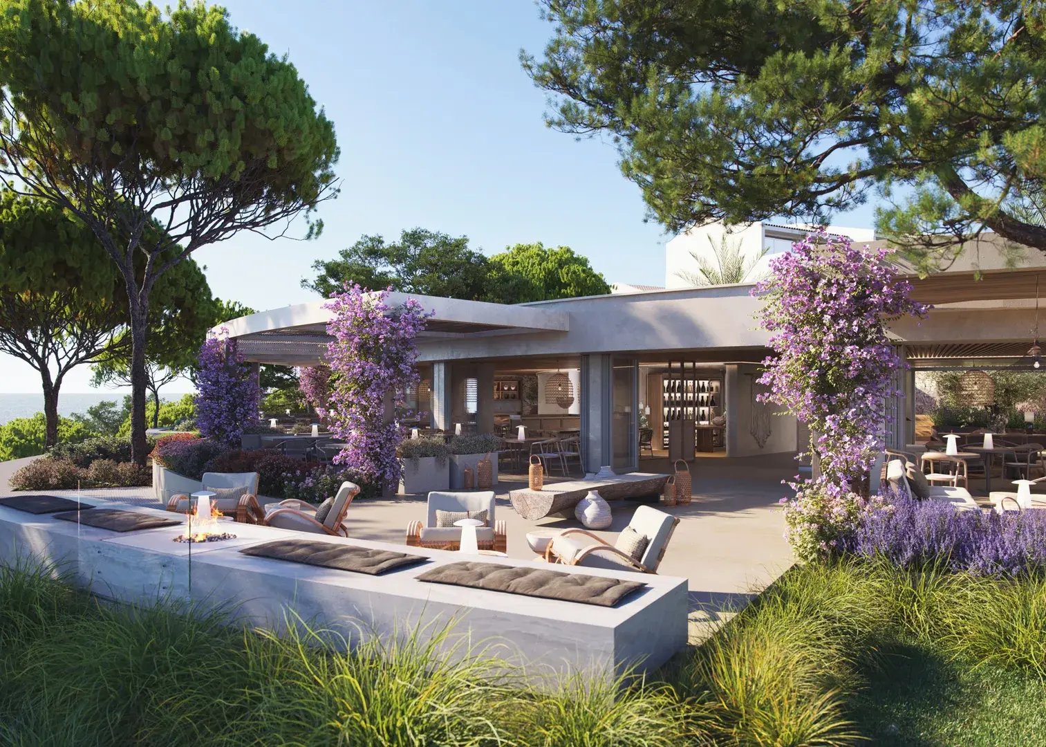 Mediterraner Garten eines Hotels mit Bar und Sitzmöbeln.
