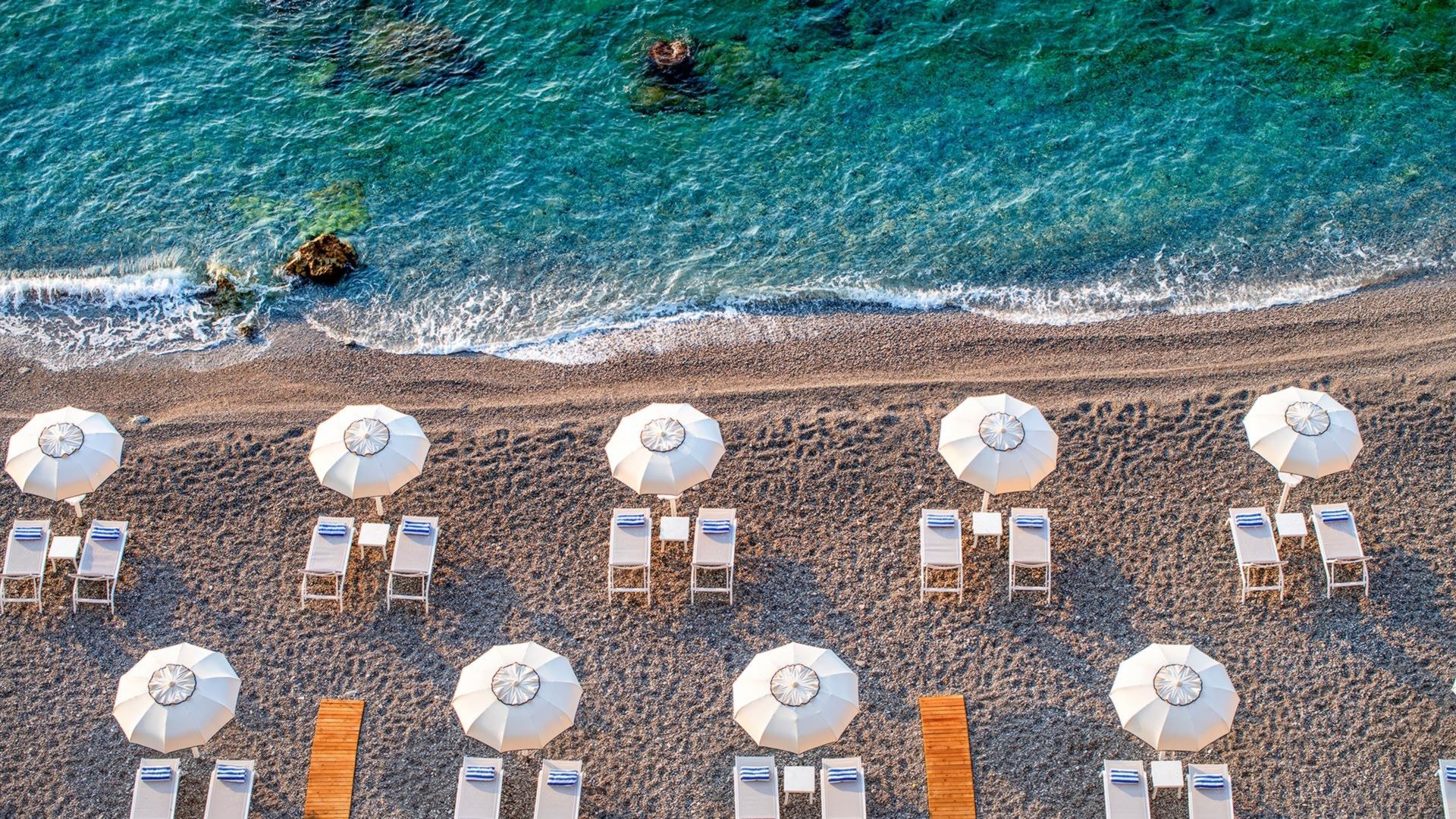 borgo-santandrea-italien-familienluxusreisen-thefamilyproject-strand