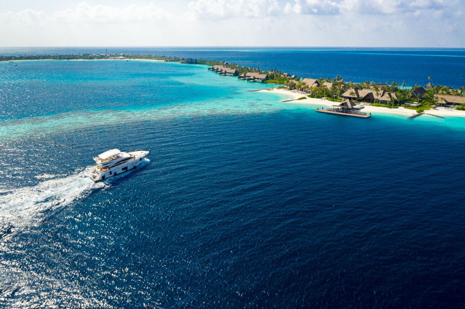 Waldorf Astoria Maldives Ithaafushi Familienluxusreisen TheFamilyProject Meer
